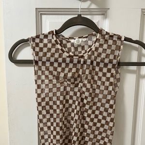 Checkered no-sleeve top with front cut-out